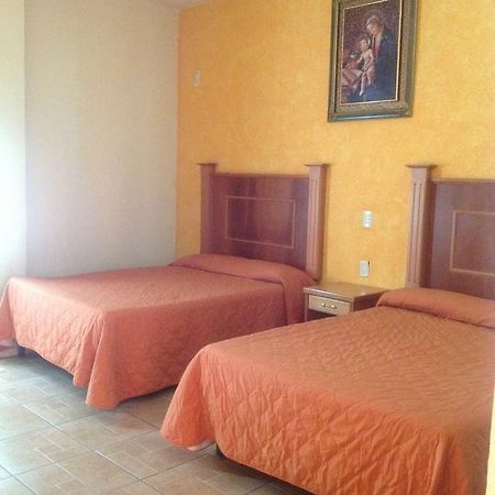 Hotel Genoves San Juan de los Lagos Kamer foto